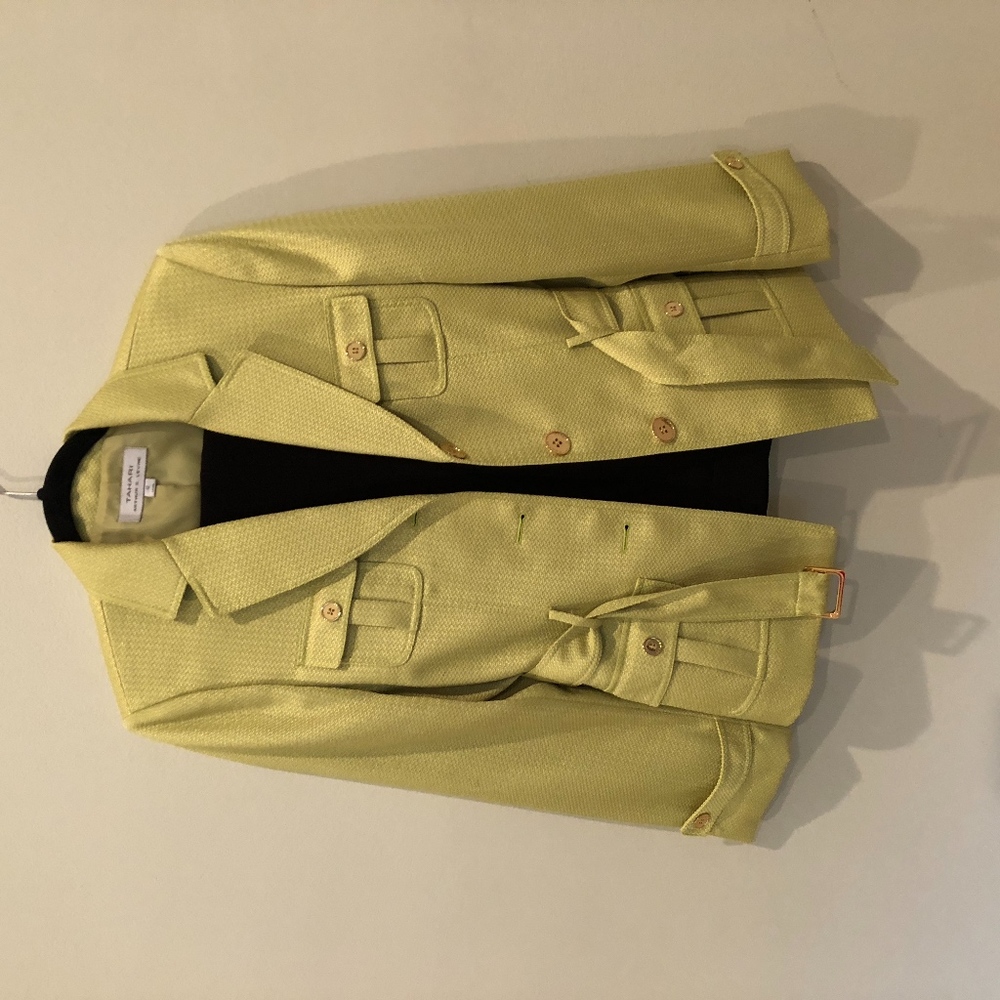 green blazer with black pants suit